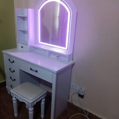 Overview: Enhance your dressing space with the stylish and functional LED light vanity mirror, available at Billy Furniture. This sleek mirror features built-in LED lighting, providing optimal illumination for makeup application, grooming, and daily routines. Whether placed on a LED light mirror dressing table or mounted on the wall, the bright yet soft lighting ensures you always have the perfect light. Its modern design adds a touch of elegance to any bedroom or dressing area, making it a must-have accessory for a chic, functional space.